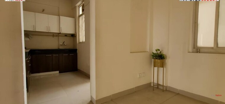 Kitchen, wave-executive-floors 2 Bedroom 900 Sq.Ft. Apartment In Wave City Ghaziabad 9182141