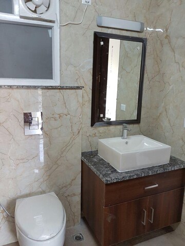 Bathroom in 3 BHK Builder Floor at Kalkaji – for Rent