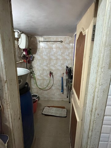 Bathroom in 1 BHK Apartment at New Gulmohar CHS, Thane West – for Sale