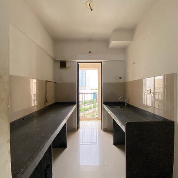 Kitchen in 1 BHK Apartment at Lodha Palava City Lakeshore Greens, Hedutane – for Rent