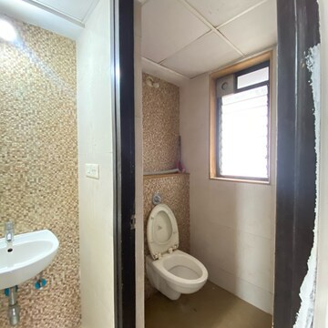 Bathroom in 1 BHK Apartment at Lodha Palava City Lakeshore Greens, Hedutane – for Rent