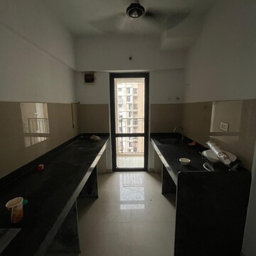 Kitchen in 1 BHK Apartment at Lodha Palava City Lakeshore Greens, Hedutane – for Rent