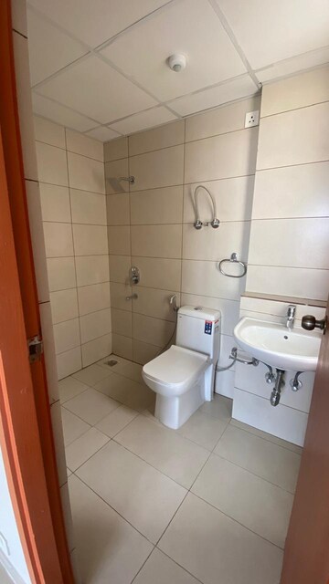 Master Bedroom in 2 BHK Apartment at Tata Eureka Park, Sector 150 – for Rent
