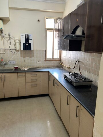 Kitchen in 1 BHK Apartment at Eureka Diya Green City, Raj Nagar Extension – for Sale