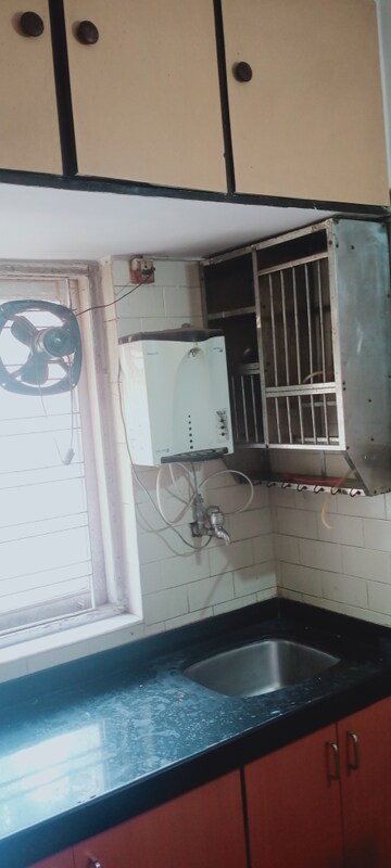 Kitchen in 1 BHK Apartment at Takshila CHS, Andheri East – for Rent