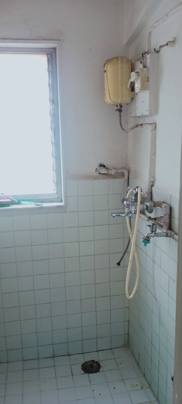 Bathroom in 1 BHK Apartment at Takshila CHS, Andheri East – for Rent