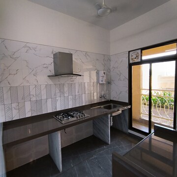 Kitchen in 2 BHK Apartment at Paradise Sai World Dreams, Kalyan Shilphata Road – for Sale