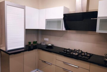 Kitchen in 2 BHK Apartment at Artique Uptown Skylla, International Airport Road – for Rent