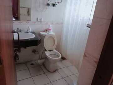 Bathroom in 2 BHK Apartment at Unitech Uniworld Gardens 2, Sector 47 – for Rent
