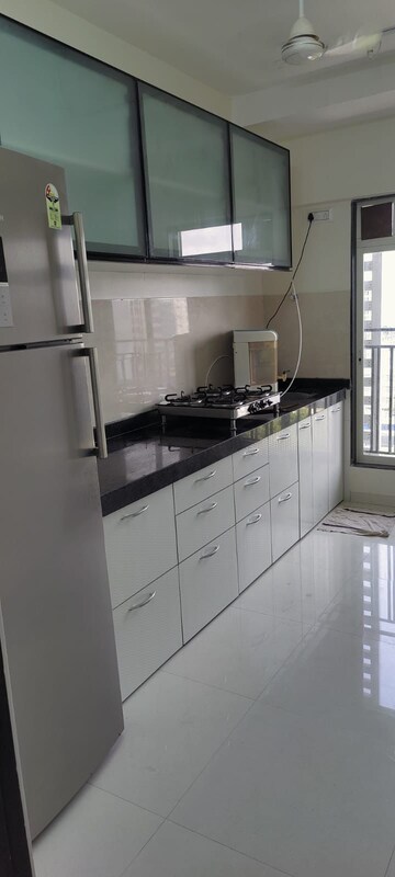 Kitchen in 2 BHK Apartment at Bini Winspace Amelio, Andheri West – for Rent