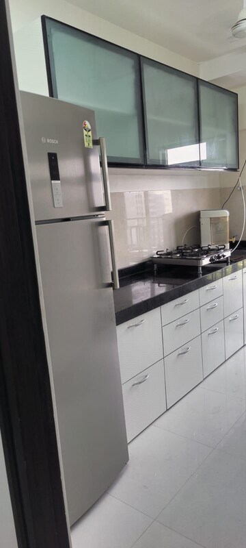 Kitchen in 2 BHK Apartment at Bini Winspace Amelio, Andheri West – for Rent