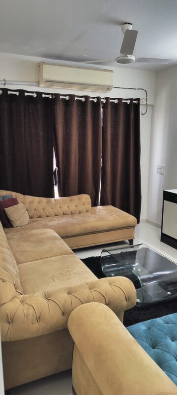 Living Room in 2 BHK Apartment at Bini Winspace Amelio, Andheri West – for Rent