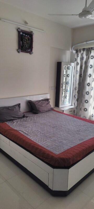 Bedroom in 2 BHK Apartment at Bini Winspace Amelio, Andheri West – for Rent