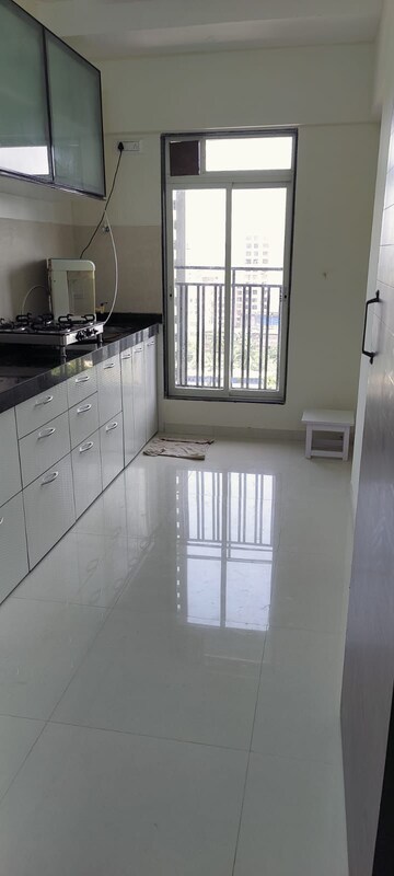 Kitchen in 2 BHK Apartment at Bini Winspace Amelio, Andheri West – for Rent