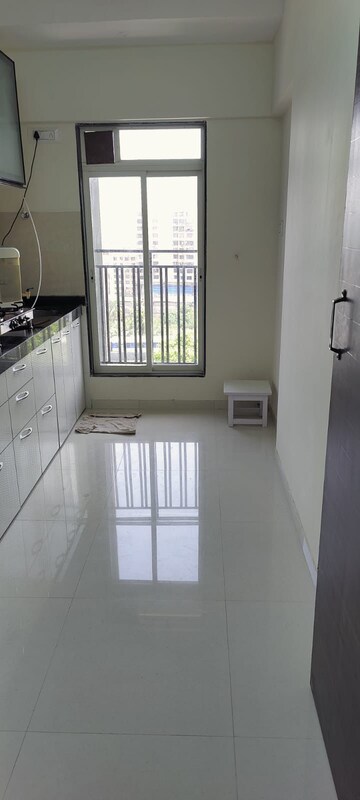 Kitchen in 2 BHK Apartment at Bini Winspace Amelio, Andheri West – for Rent