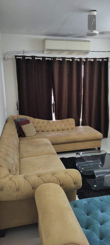 Living Room in 2 BHK Apartment at Bini Winspace Amelio, Andheri West – for Rent