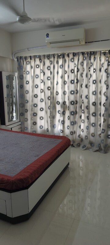 Bedroom in 2 BHK Apartment at Bini Winspace Amelio, Andheri West – for Rent