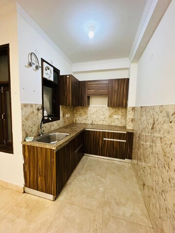 Kitchen in 2 BHK Builder Floor at Freedom Fighters Enclave – for Rent