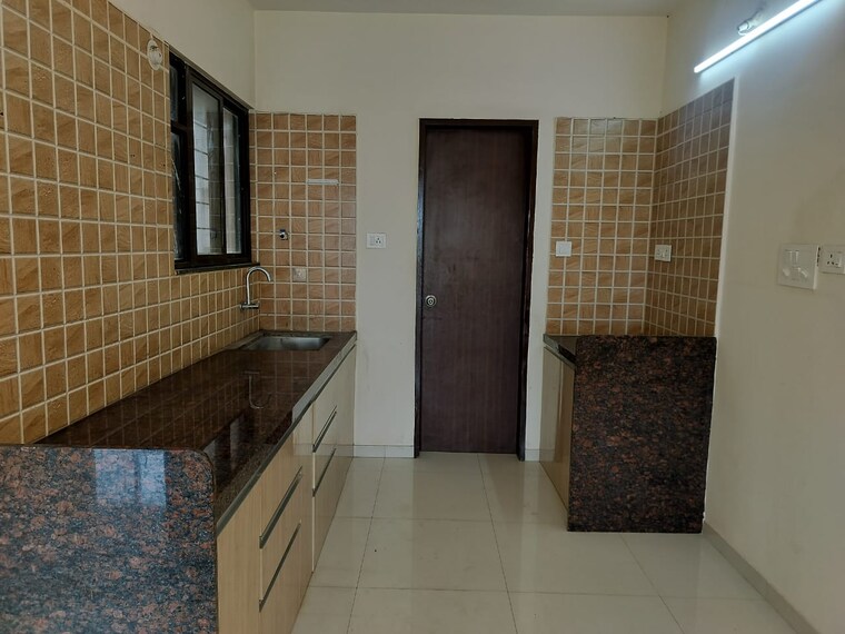 Kitchen, om-tropica 2 Bedroom 1140 Sq.Ft. Apartment In Ravet Pune 9182827