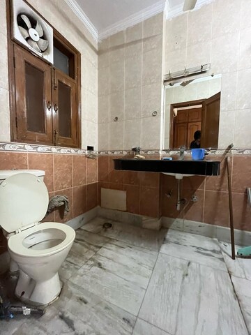 Bathroom in 4 BHK Apartment at Chattarpur – for Rent