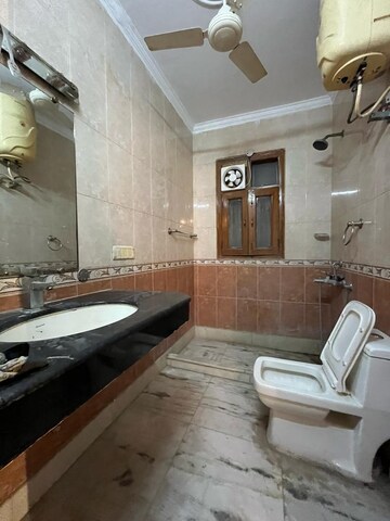 Bathroom in 4 BHK Apartment at Chattarpur – for Rent
