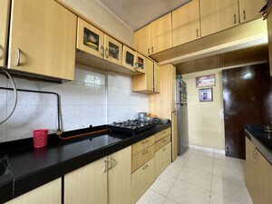 Kitchen in 4 BHK Apartment at Silver Arch Eden woods, Andheri West – for Sale