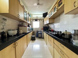 Kitchen in 4 BHK Apartment at Silver Arch Eden woods, Andheri West – for Sale