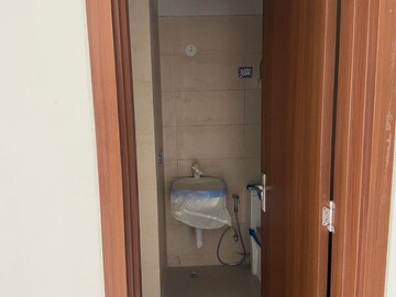 Bathroom in 3 BHK Apartment at Central Park Lake Front Towers, Sohna Sector 33 – for Sale