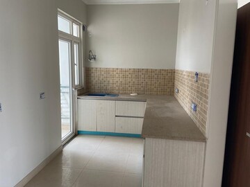 Kitchen in 3 BHK Apartment at Central Park Lake Front Towers, Sohna Sector 33 – for Sale