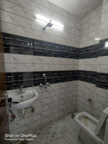 Bathroom in 2 BHK Builder Floor at Dwarka Mor – for Rent