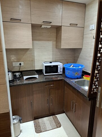 Kitchen in 1 BHK Apartment at FAOA, Sector 53 – for Rent