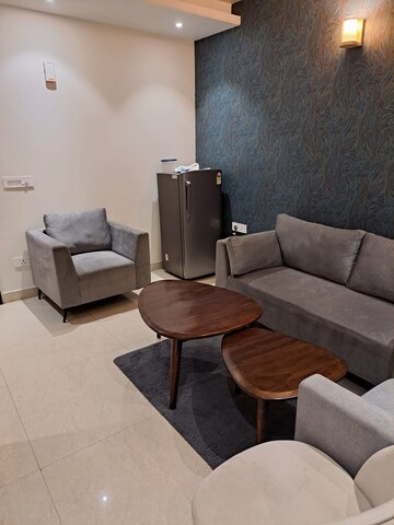 Living Room in 1 BHK Apartment at FAOA, Sector 53 – for Rent