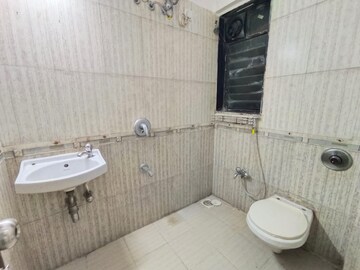 Bathroom in 2 BHK Apartment at Radhika Residency Tilak Nagar, Tilak Nagar – for Rent