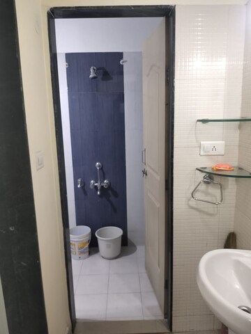 Bathroom in 1 BHK Apartment at Nisarg Hardik Phase I, Rahatani – for Rent