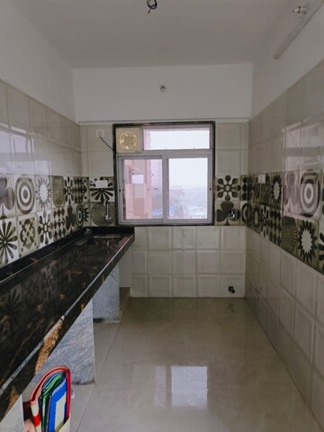 Kitchen in 1 BHK Apartment at Reliable Unique Pride, Vikhroli East – for Sale