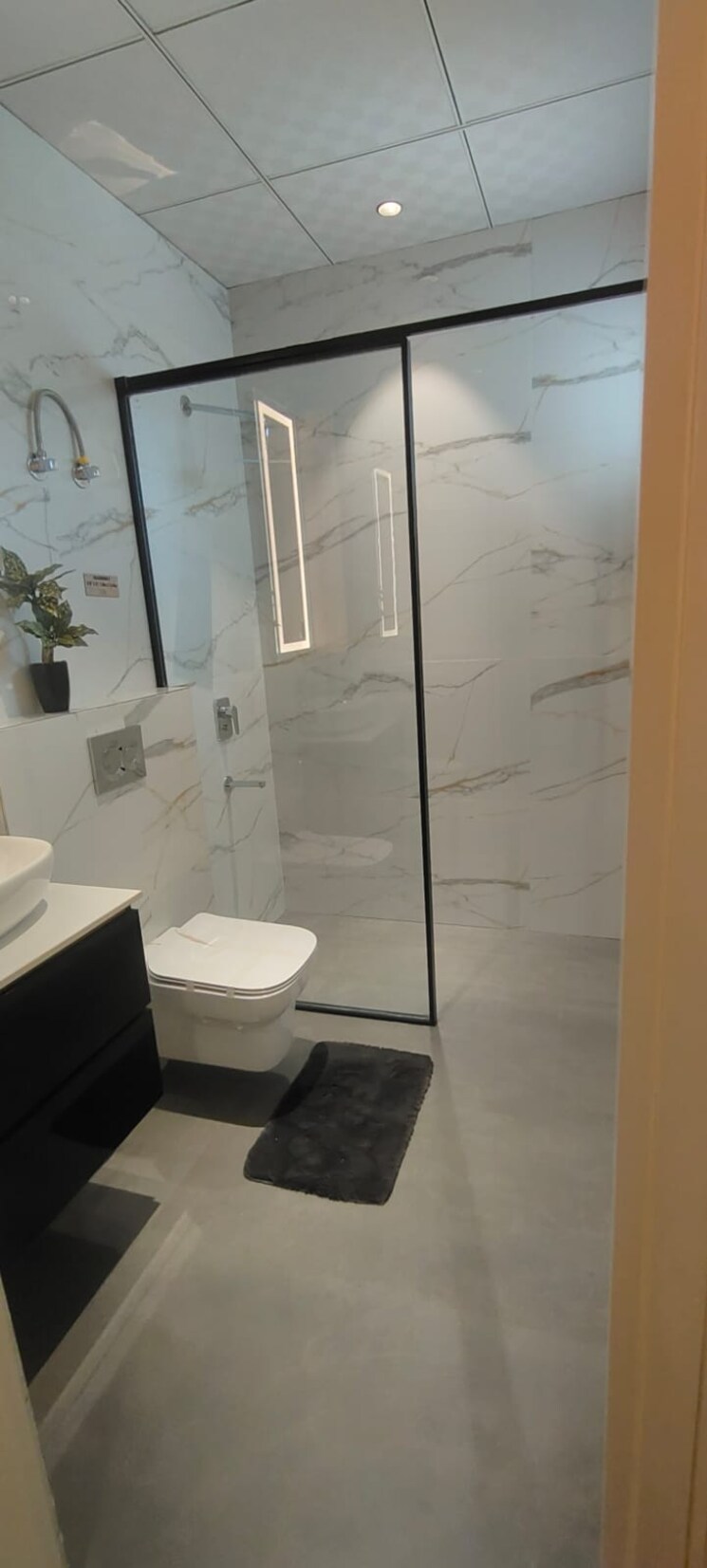 Bathroom, the-ananta-aspire 3 Bedroom 1853 Sq.Ft. Apartment In Utrathiya Zirakpur 9183359