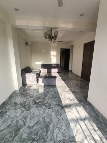 Living Room in 2 BHK Apartment at Chattarpur – for Sale