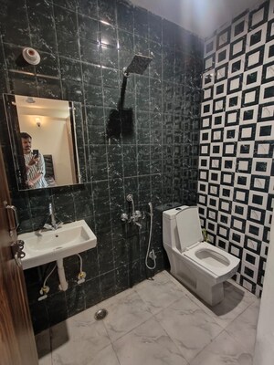 Bathroom in 2 BHK Apartment at Chattarpur – for Sale