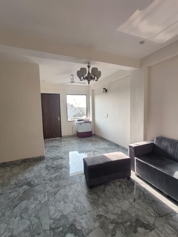 Living Room in 2 BHK Apartment at Chattarpur – for Sale