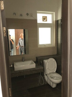 Bathroom in 2 BHK Apartment at Umang Winter Hills, Sector 77 – for Sale