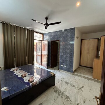 Bedroom in 2 BHK Builder Floor at Ansal Plaza Sector-23, Carterpuri Village – for Rent
