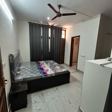 Bedroom in 2 BHK Builder Floor at Ansal Plaza Sector-23, Carterpuri Village – for Rent