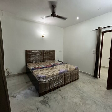 Bedroom in 2 BHK Builder Floor at Ansal Plaza Sector-23, Carterpuri Village – for Rent