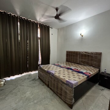 Bedroom in 2 BHK Builder Floor at Ansal Plaza Sector-23, Carterpuri Village – for Rent