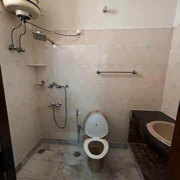 Bathroom in 2 BHK Builder Floor at Ansal Plaza Sector-23, Carterpuri Village – for Rent
