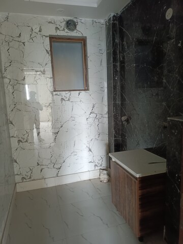 Bathroom in 4 BHK Builder Floor at Green Fields Colony – for Rent