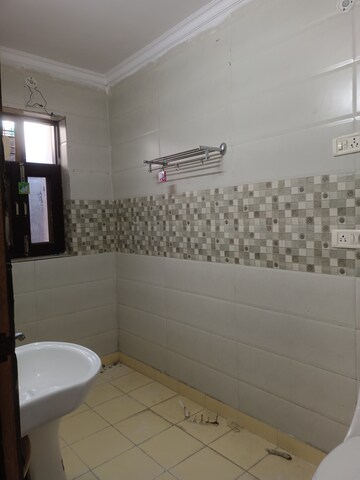 Bathroom in 3 BHK Builder Floor at Green Fields Colony – for Rent