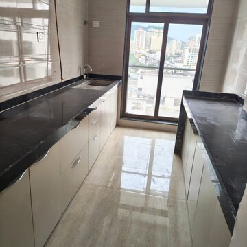 Kitchen in 2 BHK Apartment at Om Heights Malad East, Matanpur Nagar – for Rent