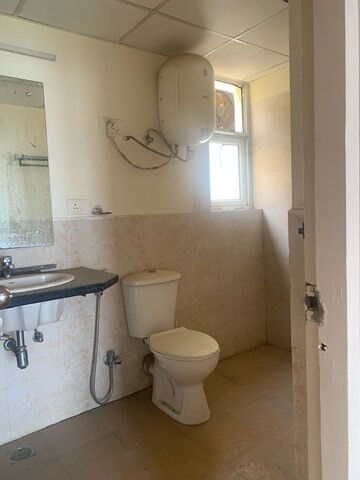 Bathroom in 4 BHK Apartment at Piedmont Taksila Heights, Sector 37c – for Rent