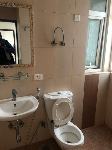 Bathroom in 3 BHK Apartment at Ramprastha City The Atrium, Sector 37d – for Rent
